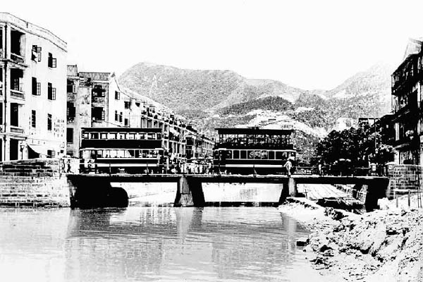 Bridge over Bowington Canal, Causeway Bay, Hong Kong Island, c. the 1920s.