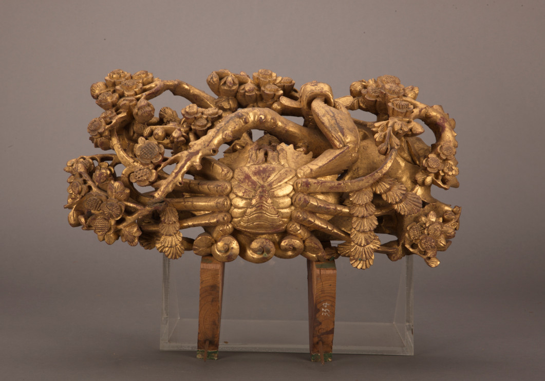 Gilt wooden beam cushion with plum blossoms and crab in openwork
